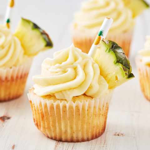 A Cupcake With Cream Color Frosting