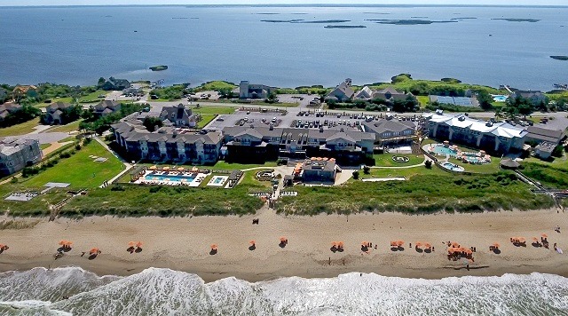 A Resort With Waves Crashing on the Shore