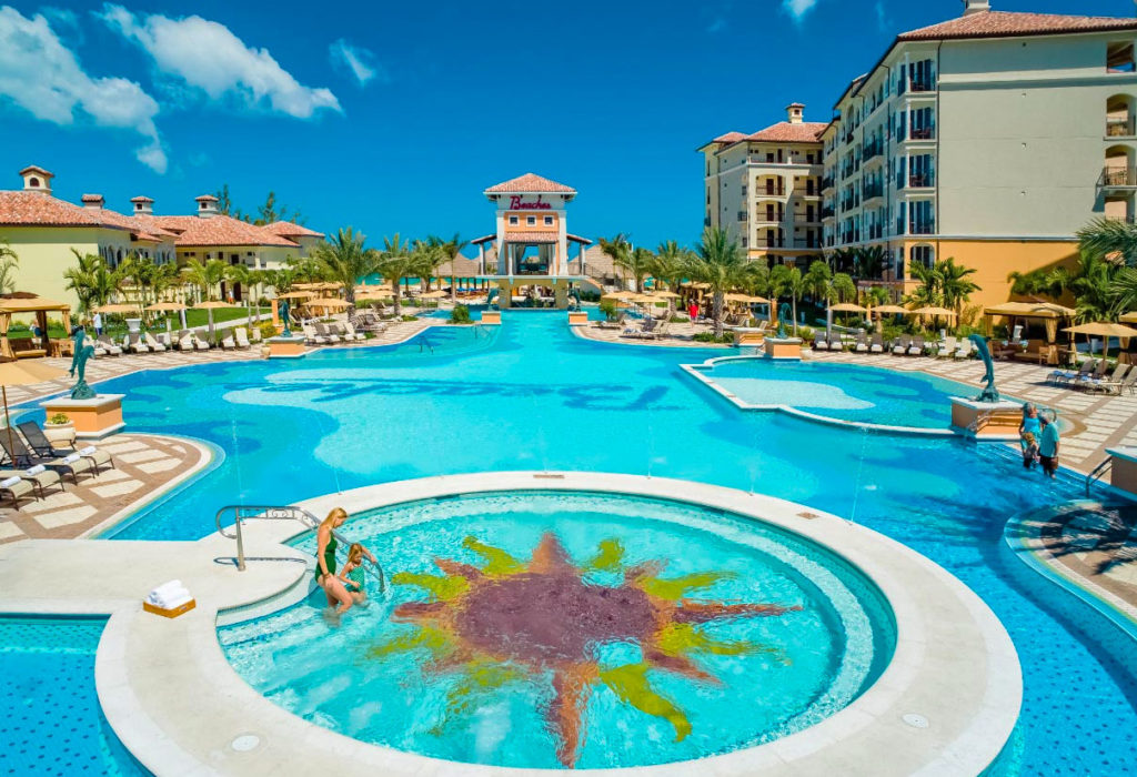 A Beach Pool With a Sun Shaped Tiles