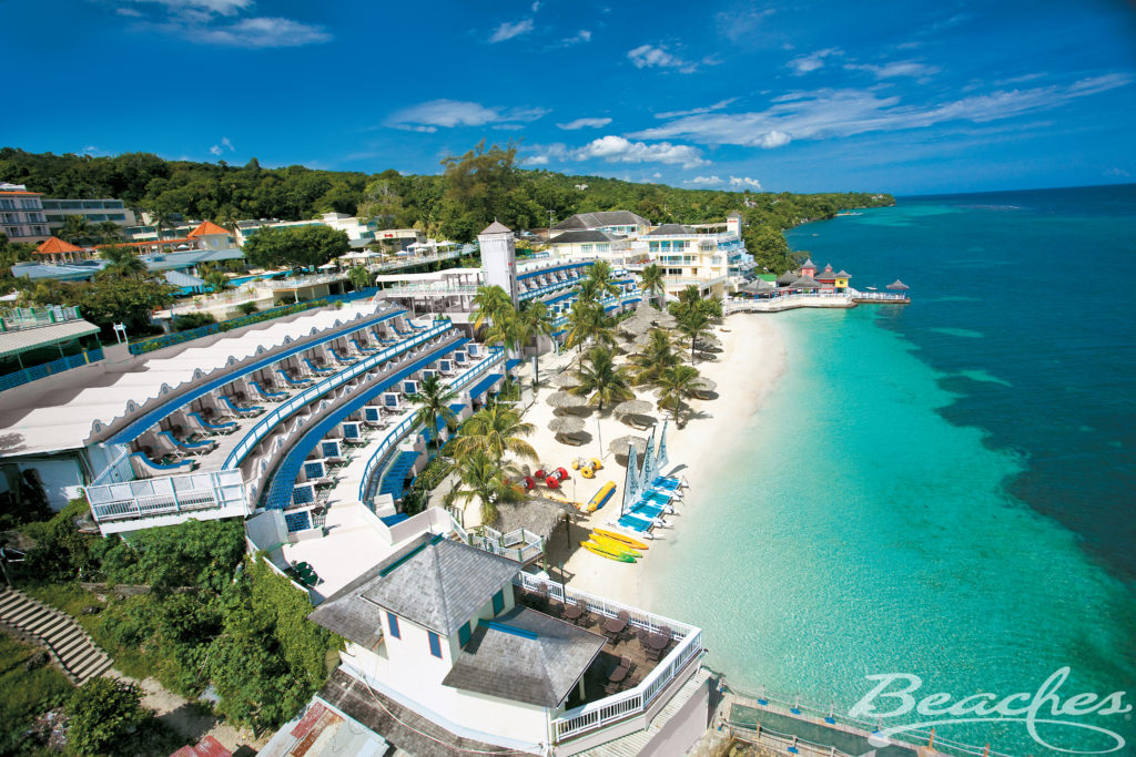 A Circular Shaped Resort With a Beach View